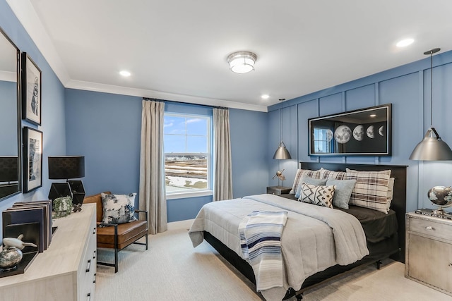 bedroom with light colored carpet and crown molding