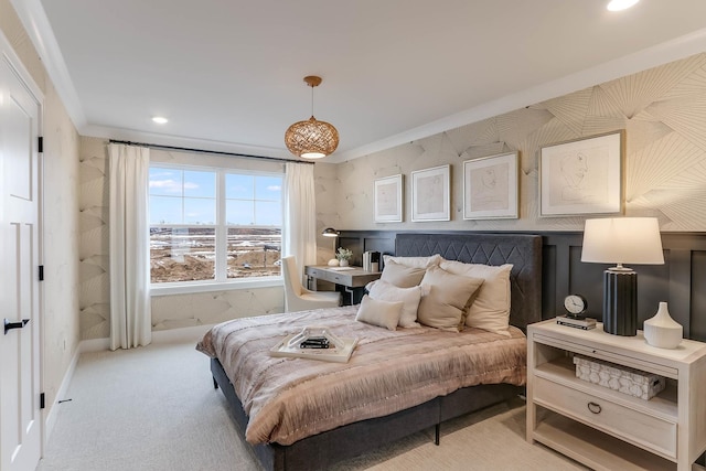 bedroom featuring crown molding and light colored carpet