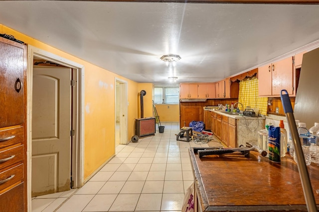 kitchen featuring sink and light tile patterned floors