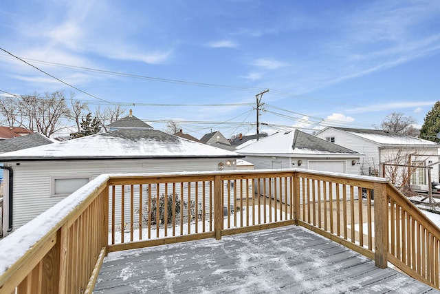 view of snow covered deck