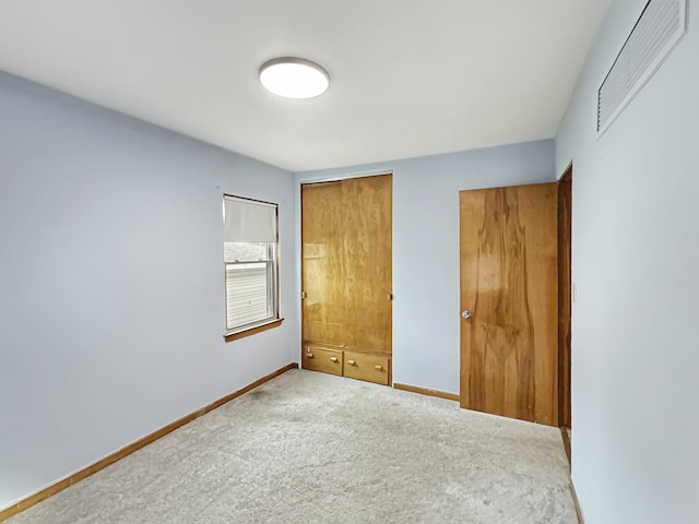 unfurnished bedroom featuring carpet floors