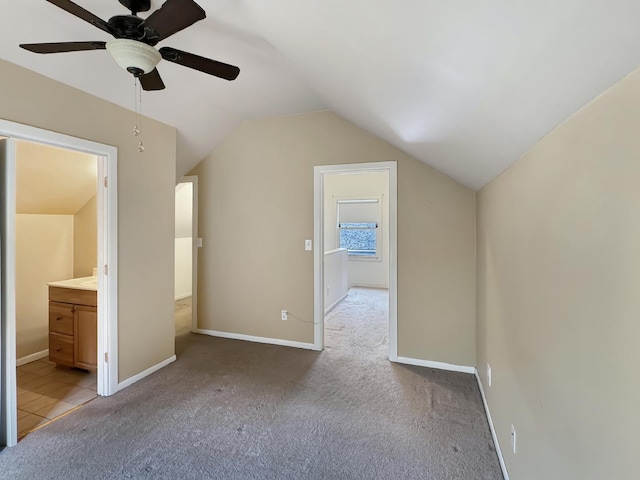 bonus room with ceiling fan, carpet floors, and vaulted ceiling