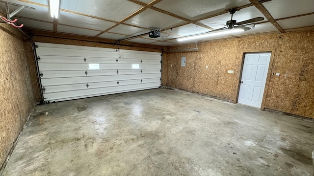 garage featuring ceiling fan and a garage door opener