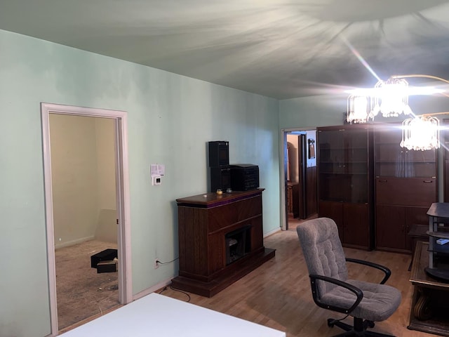 office space with light wood-type flooring