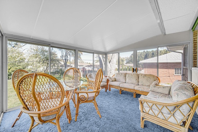 sunroom with vaulted ceiling