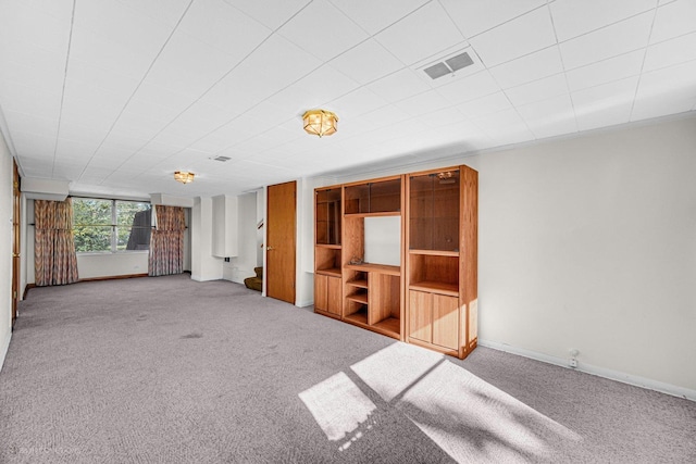 unfurnished living room with carpet