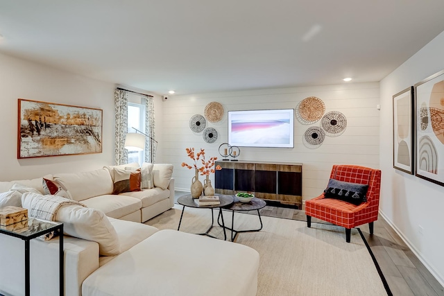 living room with light hardwood / wood-style flooring