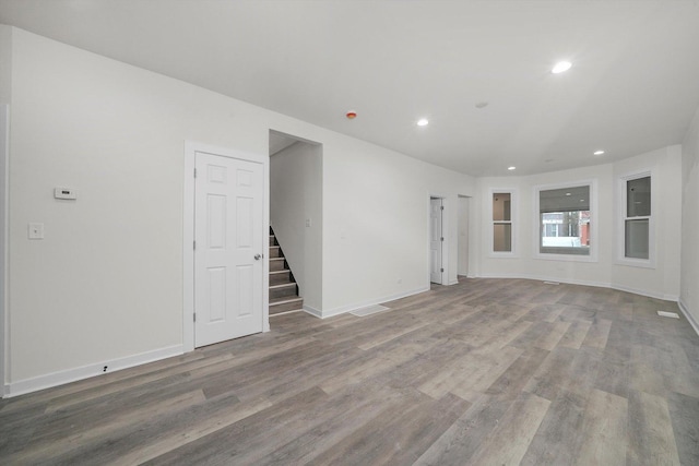 empty room featuring hardwood / wood-style floors