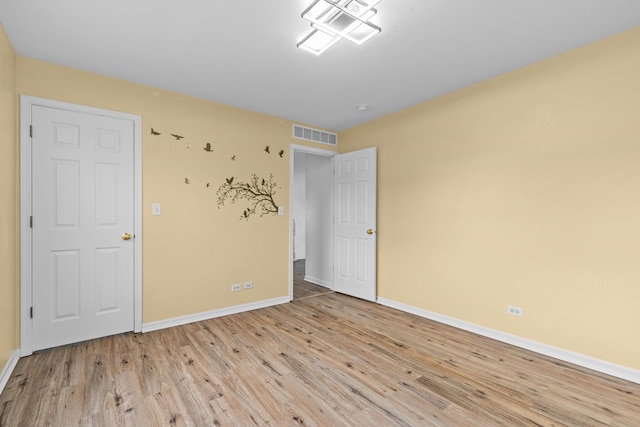 empty room featuring light wood-type flooring