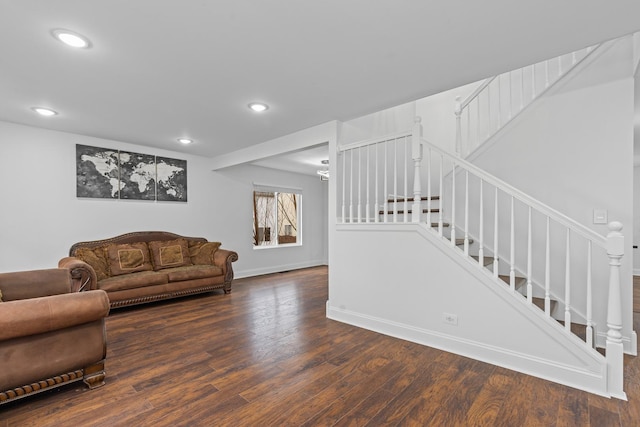 living room with dark hardwood / wood-style floors