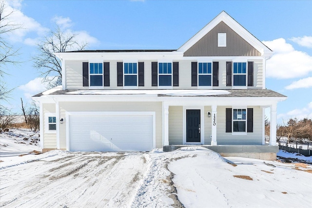 view of front of property featuring an attached garage