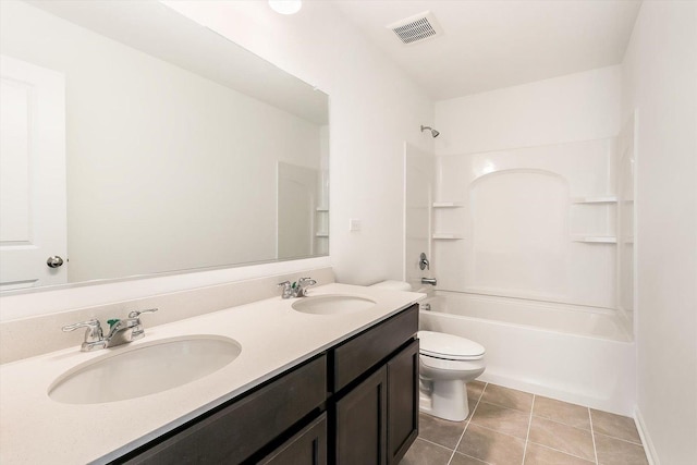 full bath with tub / shower combination, a sink, visible vents, and tile patterned floors