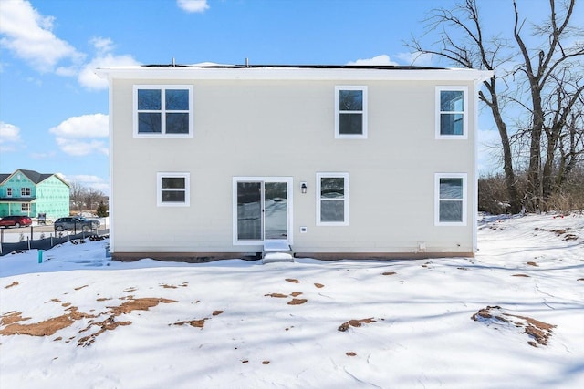 view of snow covered property