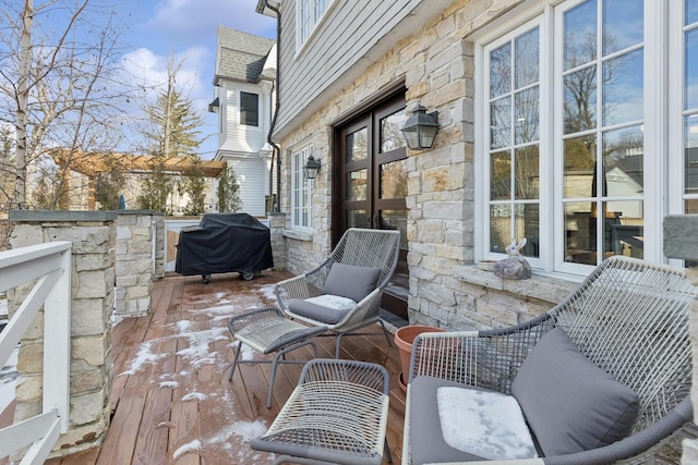 wooden terrace featuring area for grilling