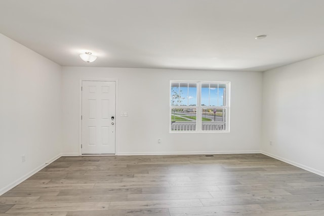 empty room featuring light hardwood / wood-style flooring