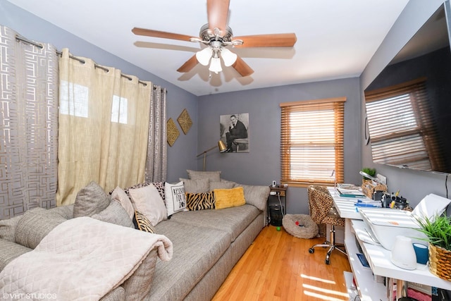 home office with ceiling fan and wood-type flooring