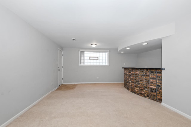 basement with light carpet