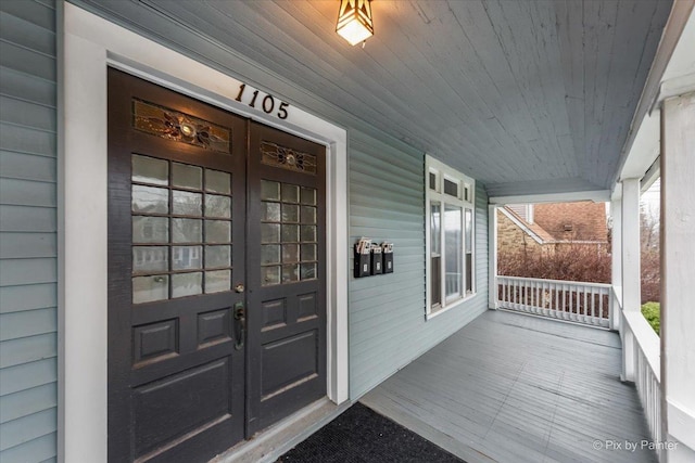 entrance to property with covered porch