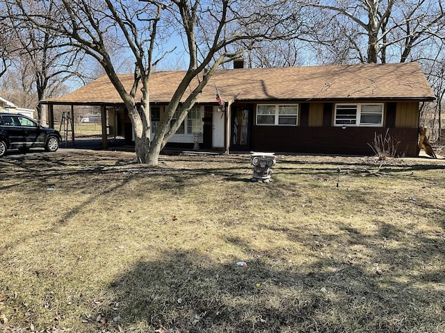 ranch-style house with a carport