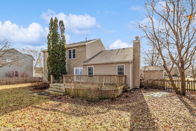 back of property featuring a deck