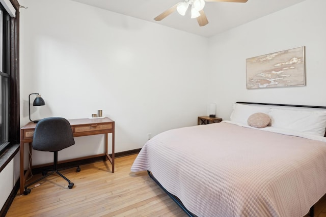 bedroom featuring ceiling fan and light hardwood / wood-style floors