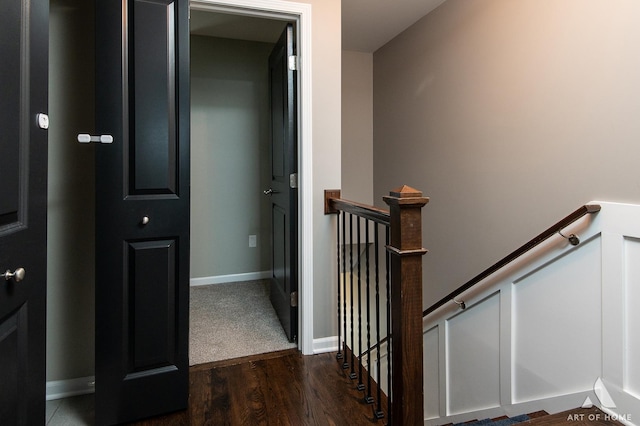 stairway with wood-type flooring