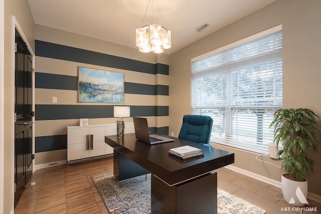 tiled office with an inviting chandelier