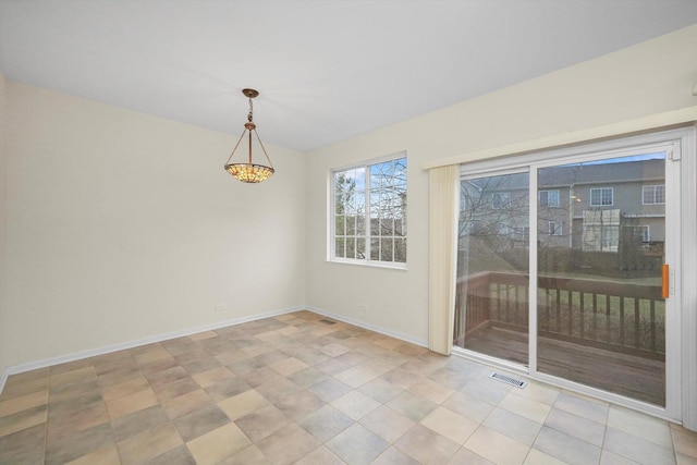 view of unfurnished dining area