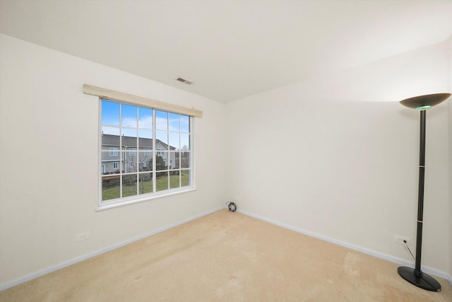 unfurnished room with carpet flooring