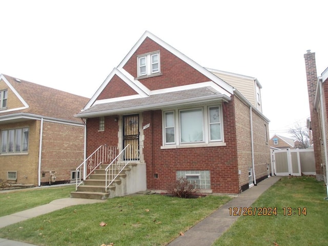 view of front of home with a front yard