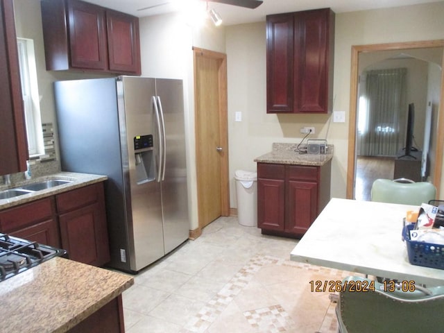 kitchen with ceiling fan, sink, light tile patterned floors, and appliances with stainless steel finishes