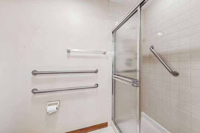 bathroom featuring an enclosed shower