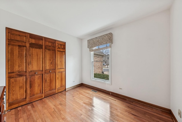 unfurnished bedroom featuring light hardwood / wood-style floors