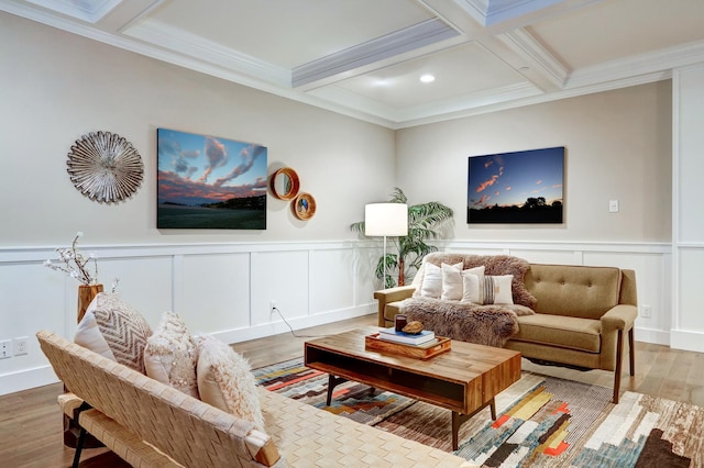 living room featuring hardwood / wood-style floors, beam ceiling, crown molding, and coffered ceiling