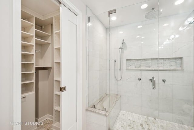 bathroom featuring walk in shower