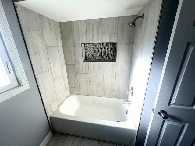 bathroom featuring  shower combination