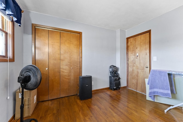 miscellaneous room featuring wood-type flooring