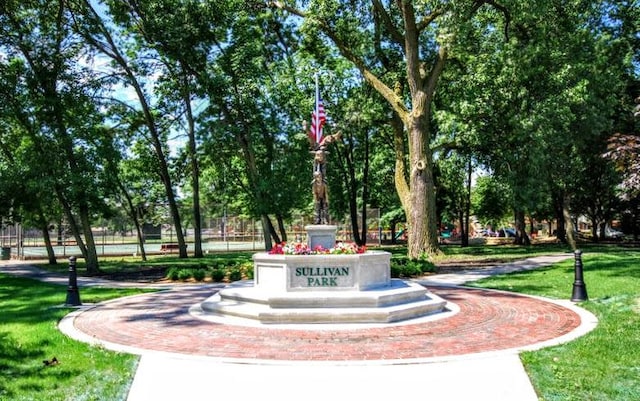 view of community featuring a yard