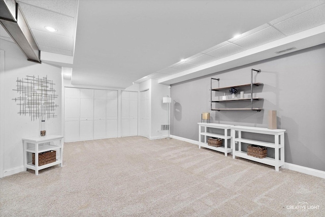 basement with carpet flooring