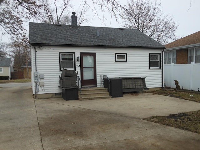 back of house with a patio area