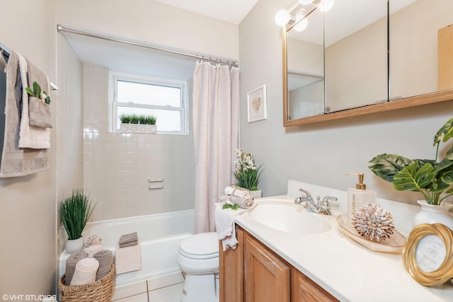 full bathroom with tile patterned flooring, shower / bath combination with curtain, vanity, and toilet