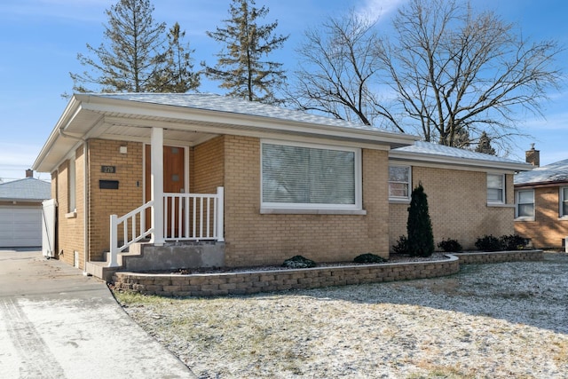 view of front of property with an outbuilding and a garage