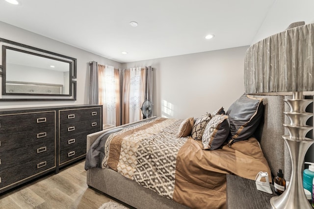 bedroom with light hardwood / wood-style flooring