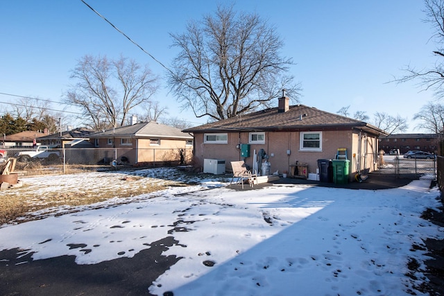 view of snow covered property