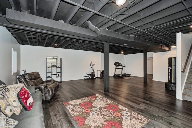 basement featuring dark hardwood / wood-style floors