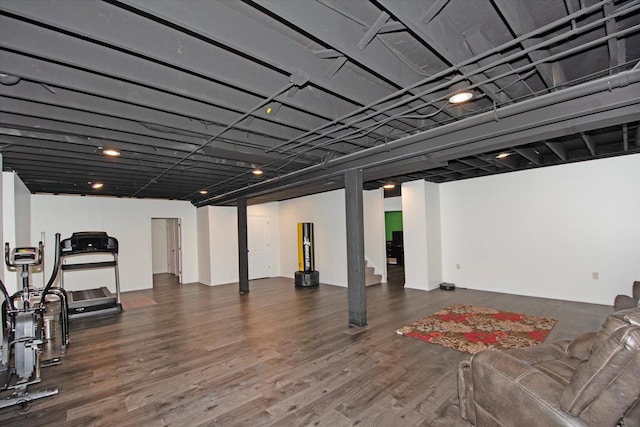 basement featuring dark hardwood / wood-style floors