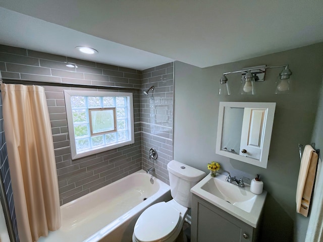 full bathroom with shower / bath combo, toilet, and vanity