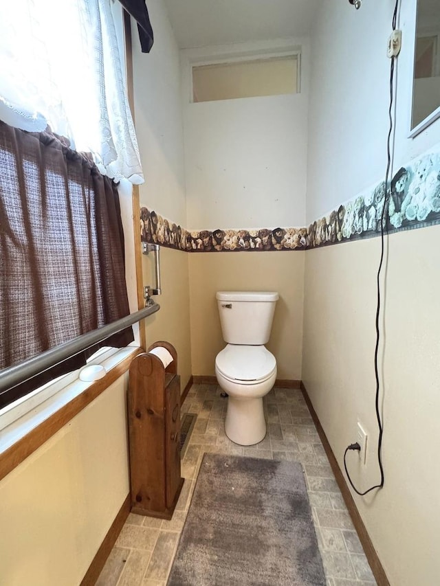 bathroom featuring toilet