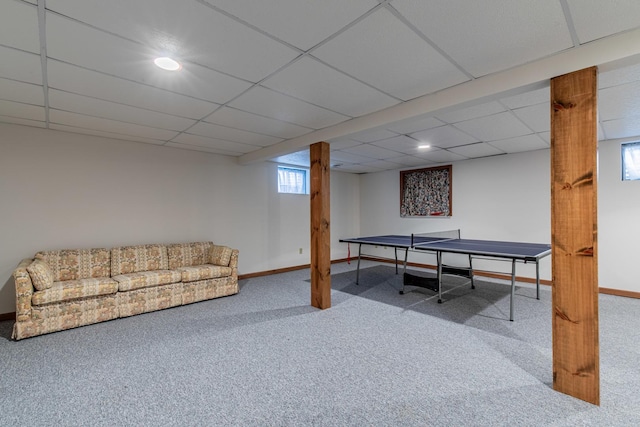 playroom featuring a paneled ceiling and carpet