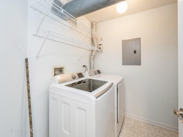 washroom featuring washer and dryer and electric panel